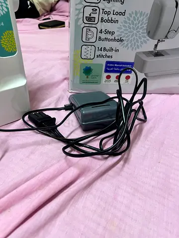 Compact portable sewing machine with foot pedal - light use