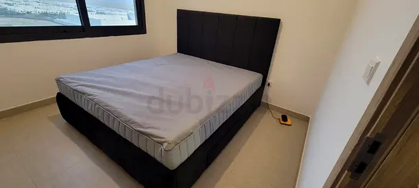 Queen size upholstered bed frame with mattress - good condition