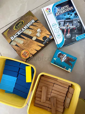 Collection of family board games and wooden building blocks