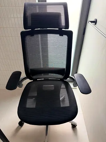 Ergonomic Black Mesh Office Chair with Headrest, used few time. Bought from WORKSPACE.