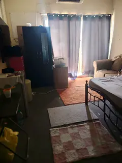 Semi furnished Sharing room available for couples/single. Near Al Diyafa roundabout satwa