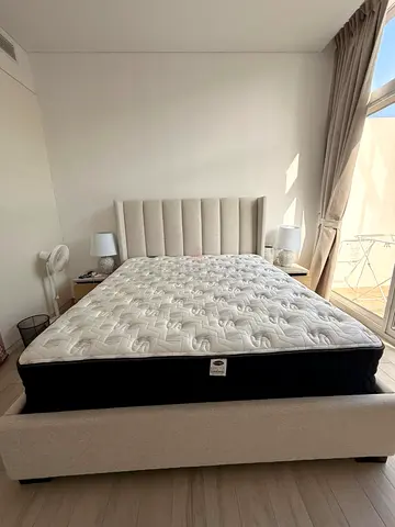 King Bed Frame with Mattress — Neutral Upholstered Headboard