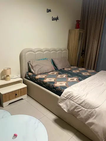 Beige storage king bed frame with headboard and mattress included