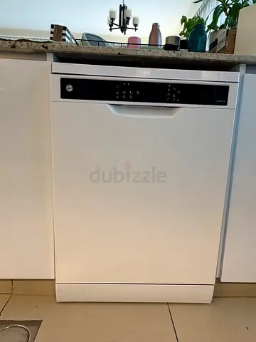 White freestanding dishwasher in good working condition, 2.5 yr old only