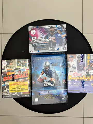 Collection of Sealed Topps Baseball  Football Trading Card Boxes