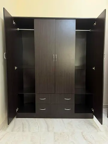 Dark wood 4-door wardrobe with drawers and hanging rail - good condition