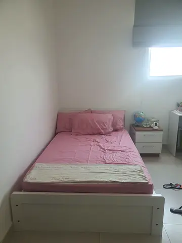 Brown wooden single bed with mattress and bedside drawer from IKEA (used)