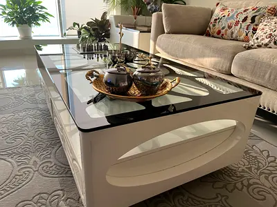 Modern glass coffee table with black organic-pattern base- top quality going cheap for urgent sale