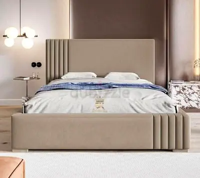 Modern upholstered double bed with padded headboard and footboard