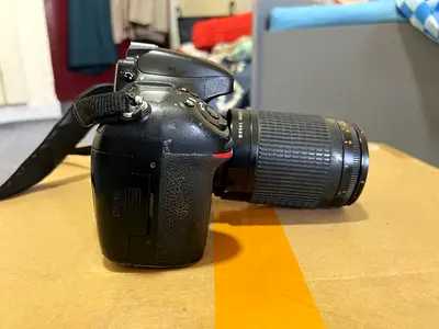 Used Nikon DSLR with 55-200mm Zoom Lens - Good Working Condition