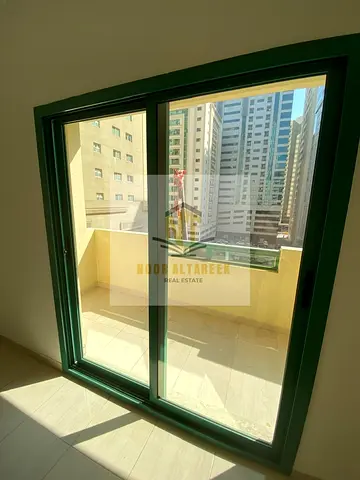 Apartment in Al Taawun, two rooms and a hall, at a competitive price with no administrative fees