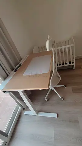 Height-adjustable wooden study desk with ergonomic chair