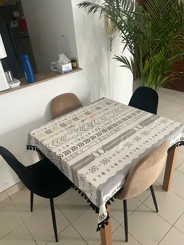 One extendable dining table with 4 chairs. AED 500