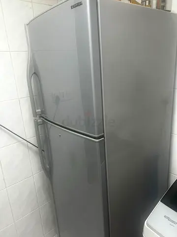 Toshiba Silver Top-Freezer Refrigerator - Good Condition