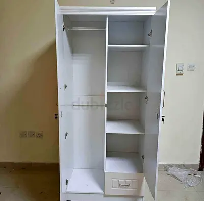 Brand NEW Two Door wardrobe with Shelves and Drawers
