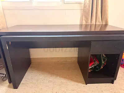 Used dark brown wooden study desk with drawer and open shelf