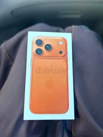 Brand new sealed Apple iPhone (in box) - Orange/Coral color. TDRA approved