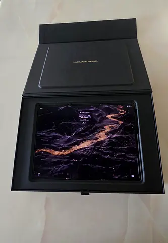 Huawei Mate xt, 10.2 inch led screen, triple fold 16gb ram, 512 gb storage black and gold