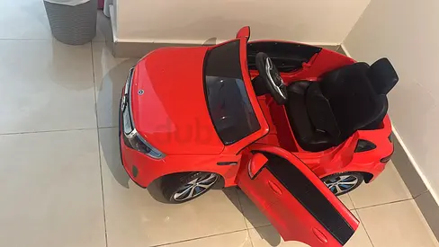 Red Electric Ride-On Toy Car (Battery Powered) - Very Good Condition.