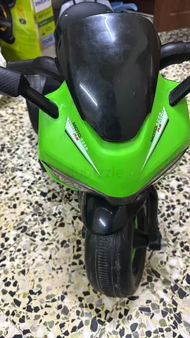 Green Ride-On Motorcycle for Kids — Good Working Condition