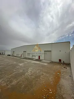 Spacious Industrial Warehouse with Prime Main Road Access | Al Sajaa