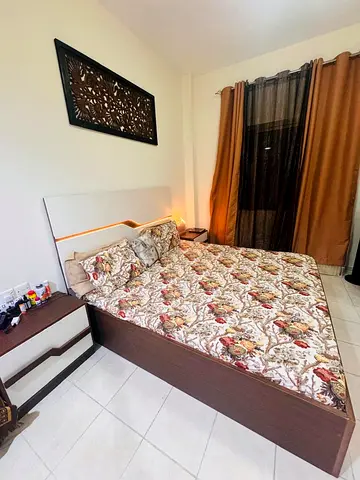 King size box bed with lights headboard,mattress and bedside 2 tables excellent condition 1 Year old