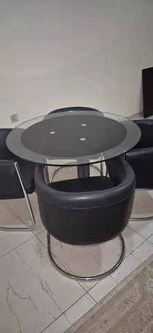 Modern Round Glass Dining Table with 4 Black Leather Stools