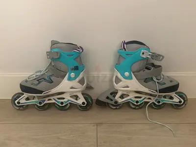 Pair of girls inline roller skates, adjustable size, good condition