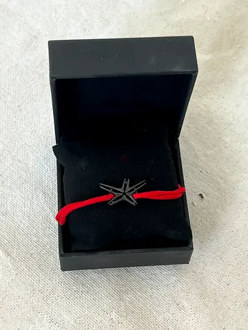 Roger Dubuis bracelet with black steel star charm (pre-owned)