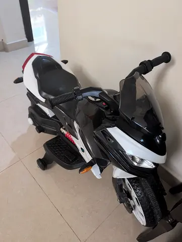 Child’s Electric Ride-On Motorcycle (black  white) - good condition