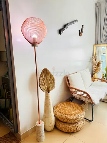 Tall and heavy base Decorative floor lamp in rose gold mesh shade