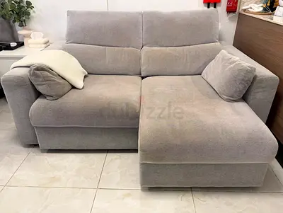 Light grey two-seater chaise lounge sofa – comfy, good condition