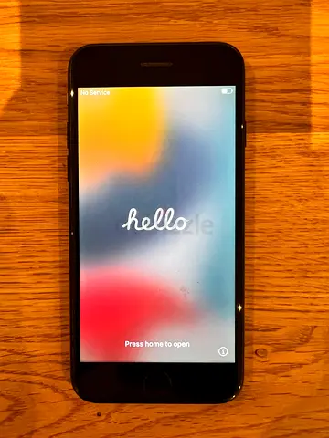 iPhone 7 - 128GB, All Genuine Good Working Condition. With blue wallet case