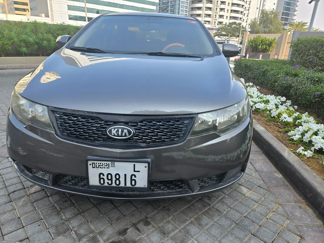 Kia Cerato 2013 — photo 1 of 11