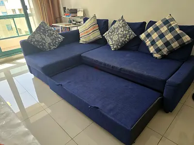Blue L-shaped Sofa with Pull-out Storage — Good Condition