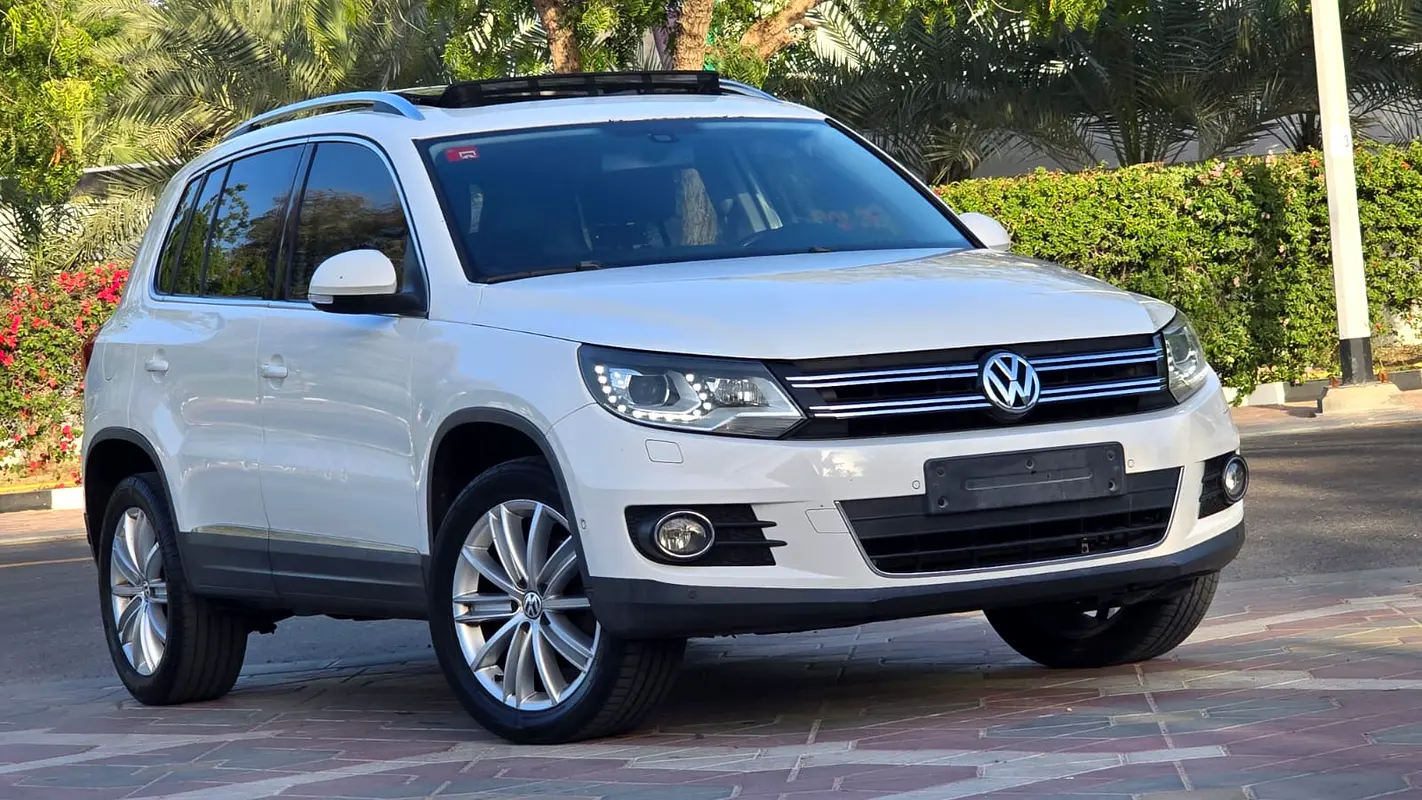 Volkswagen Tiguan 2014 — photo 1 of 19