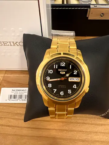 Seiko Gold-Tone Men’s Automatic Watch with Black Dial (Day/Date)