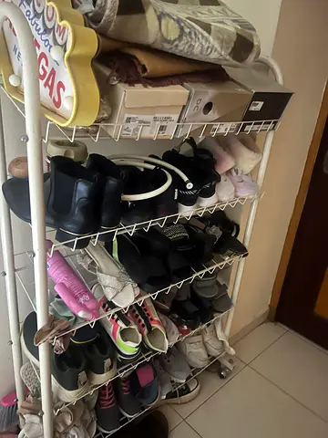 Shoe rack with multiple pairs of shoes — sturdy 4-tier metal organizer