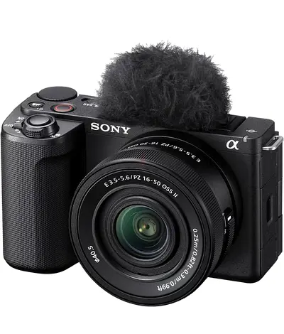 Sony Alpha mirrorless camera with 16-50mm kit lens and external mic (good condition)