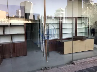 كورنر شوب | برج الأعمال الدولي | إطلالة على البرج والقناة
