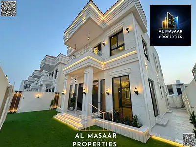 A 4-bedroom master villa in Al Helio, opposite Ajman Park, featuring two majlis (formal sitting rooms), two living rooms, and a maid's room. The land