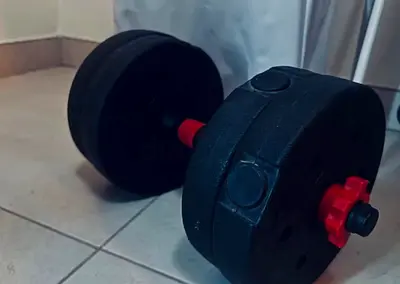 Adjustable barbell and dumbell set with plates included
