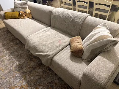 Light beige 3-seater fabric sofa in good condition