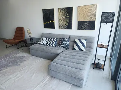 Light grey L-shaped fabric sofa with chaise lounge (excellent condition)