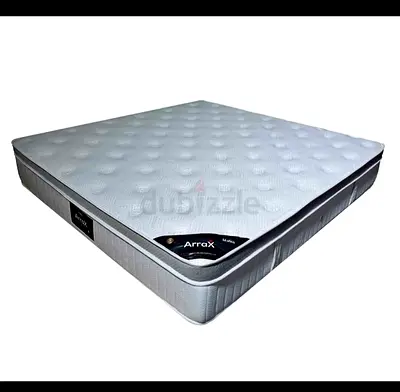 Queen-size mattress in good condition - comfortable foam/coil combo