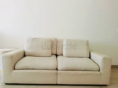 Cream 2-Seater Sofa - Good Condition