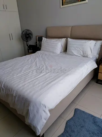 Queen fabric upholstered bed frame with headboard and storage, 2 side tables and dresser with mirror