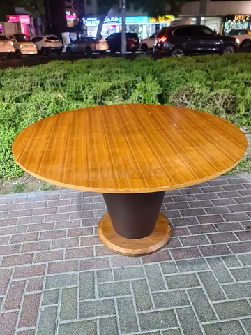 Round Wooden Dining Table with Central Pedestal Base