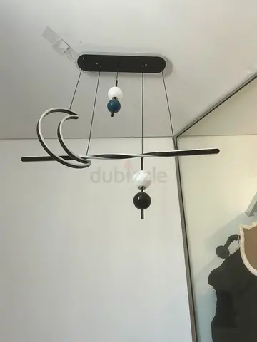 Modern hanging pendant light fixture with sculptural design (used)