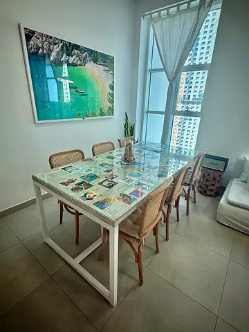White Glass-Top Dining Table with 6 Rattan Chairs